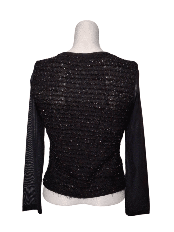 Juoda blizganti palaidinė, S